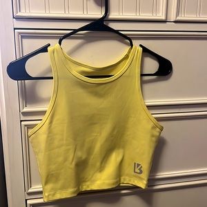 Yellow Buffbunny cropped tank size S